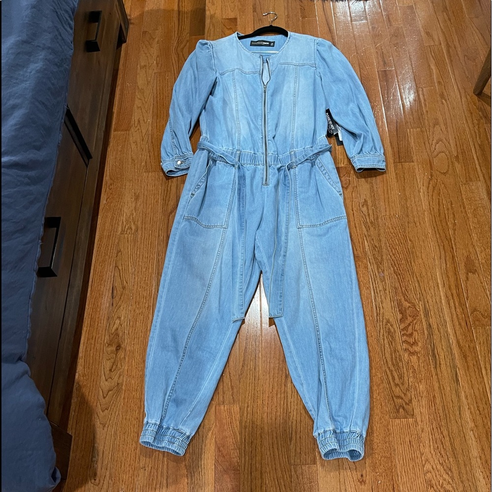 Brand new jogger jumpsuit, 56 inch long from top to bottom and 19 1/2 pit to pit